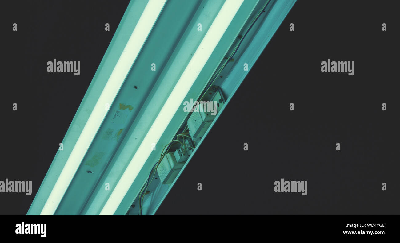 Low Angle View Of Fluorescent Light In Darkroom Stock Photo Alamy