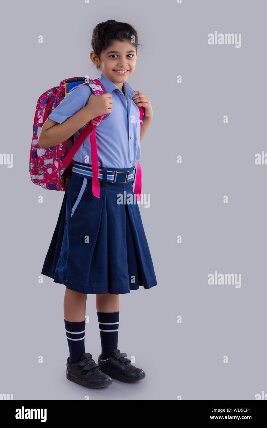 portrait of a school girl with a bag smiling Stock Photo - Alamy