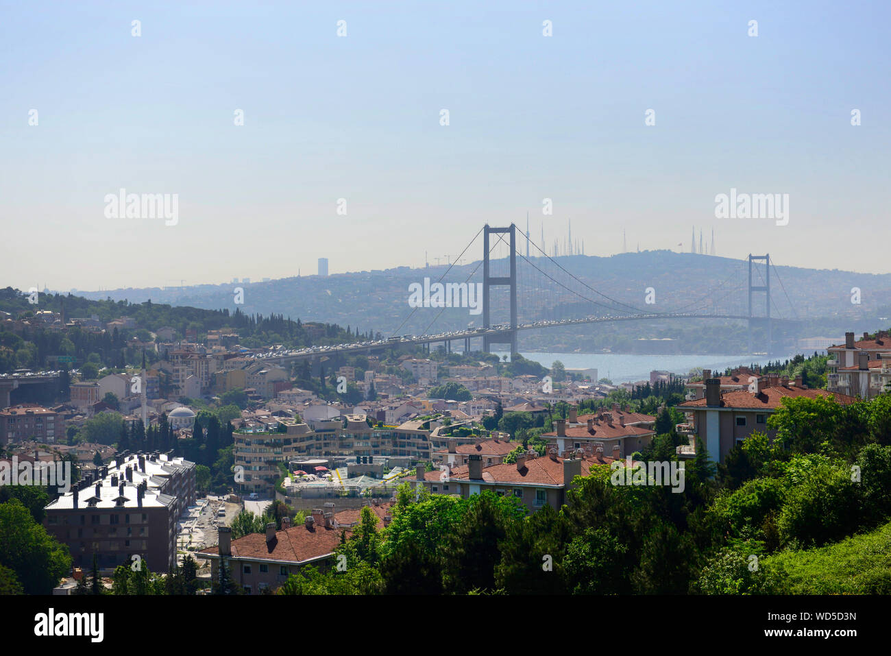 The Bosphorus bridge connects Ortaköy in the European side of Istanbul with Beylebeyi on the Asian side of the city. Stock Photo