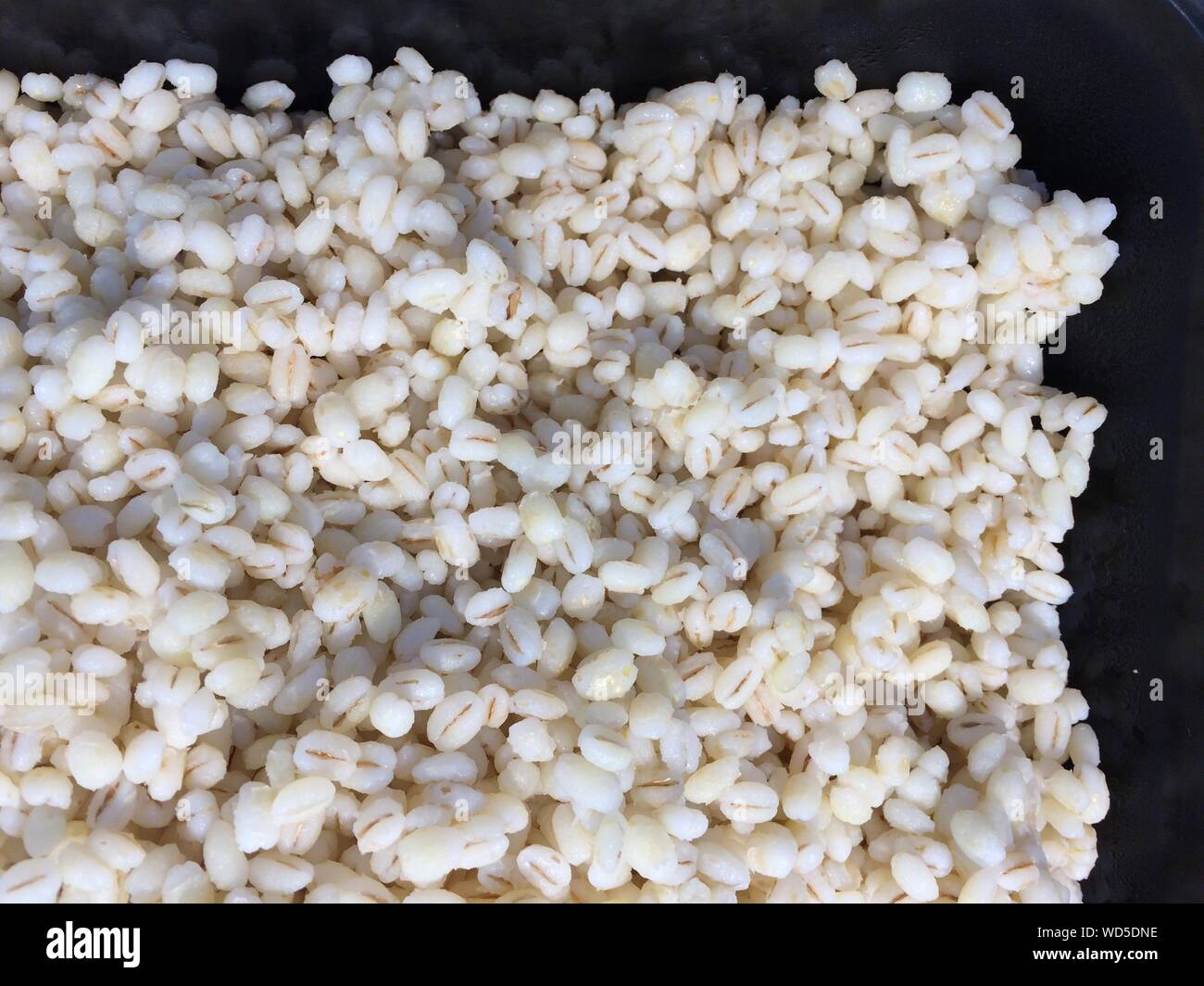 White rice cooked above hi-res stock photography and images - Alamy