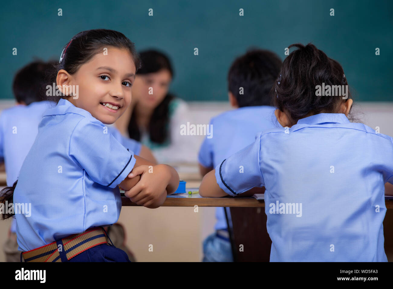 Girl smiling teacher in hi-res stock photography and images - Alamy