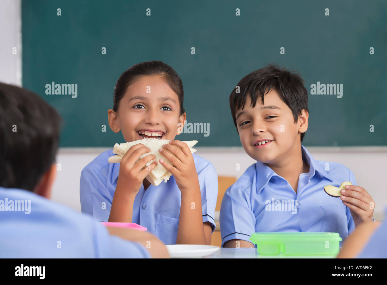 children eating sandwich in lunch in class Stock Photo Alamy