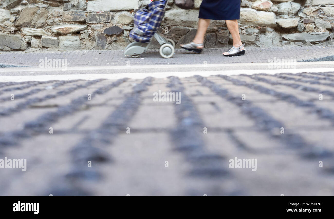 Low Section Of Woman With Baby Stroller Stock Photo