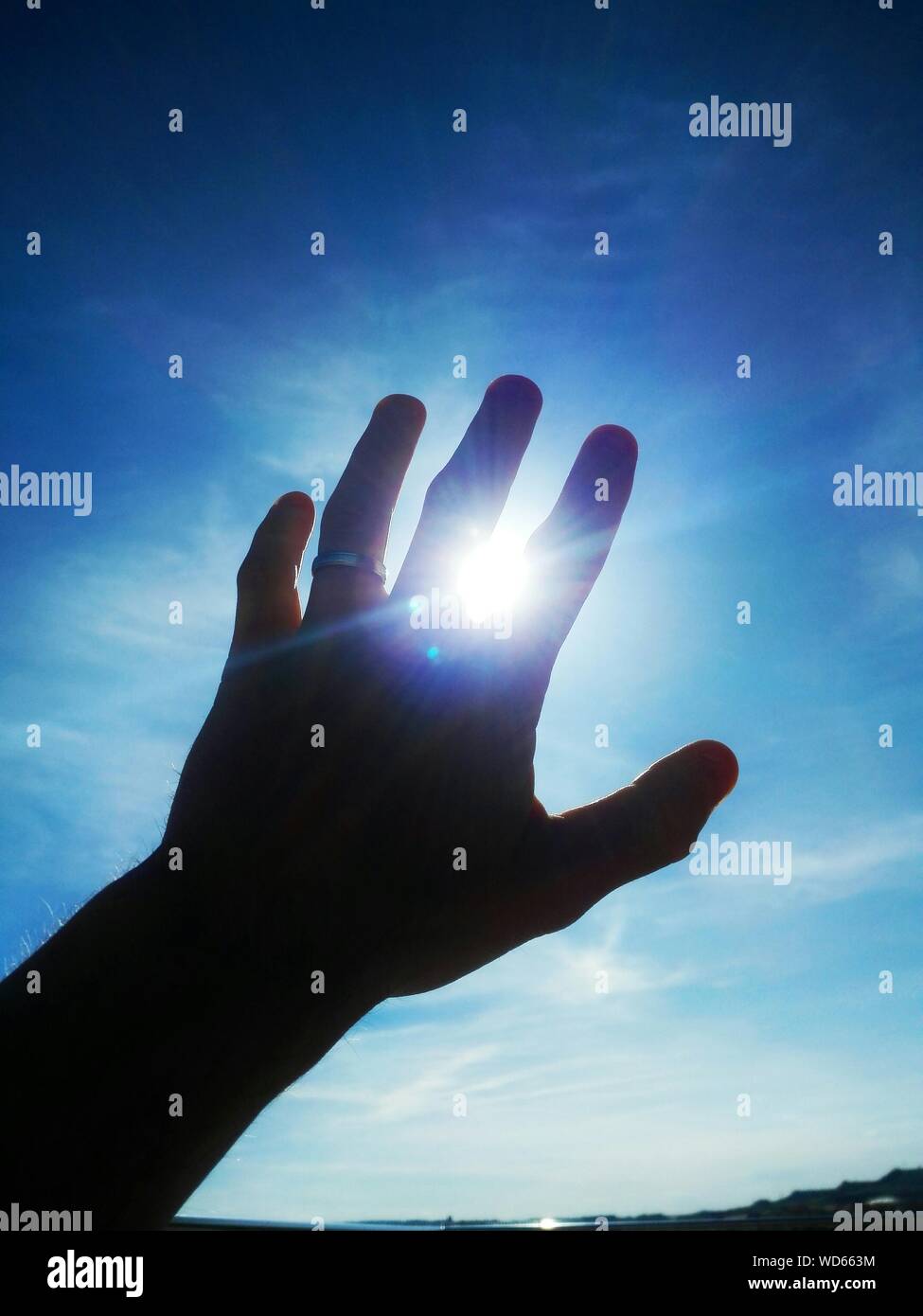Hand reaching to sky hi-res stock photography and images - Alamy
