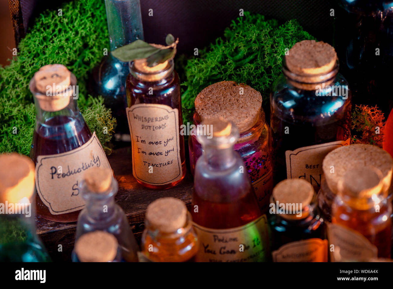 Potions, mixtures, and remedies for inspiration, motivation and productive work close-up. Handwritten potion label. Broken heart cure concept. Stock Photo