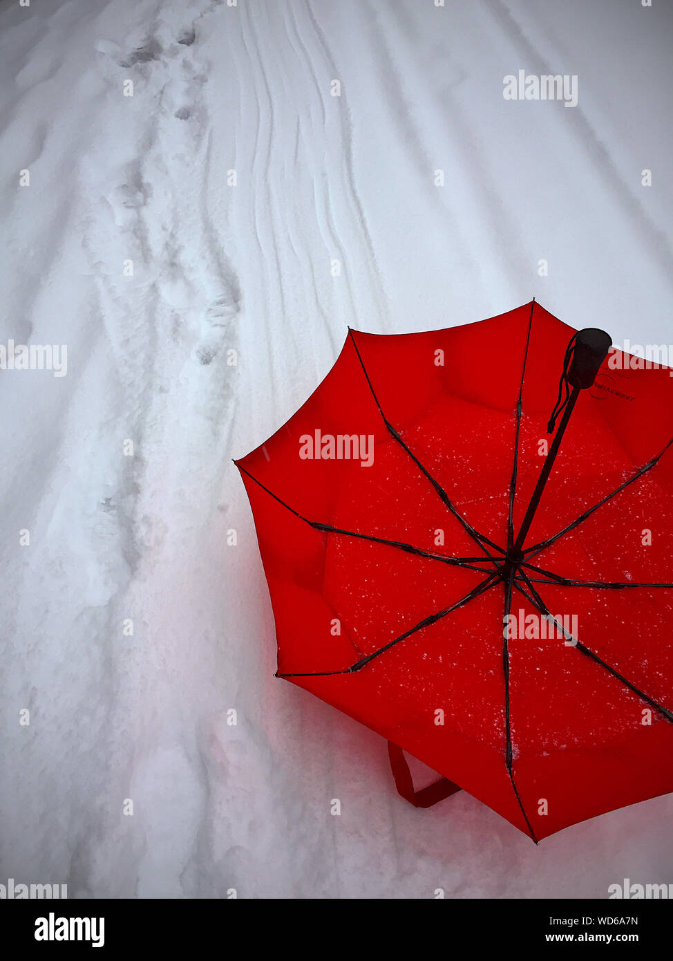 Red umbrella winter snow hires stock photography and images Alamy