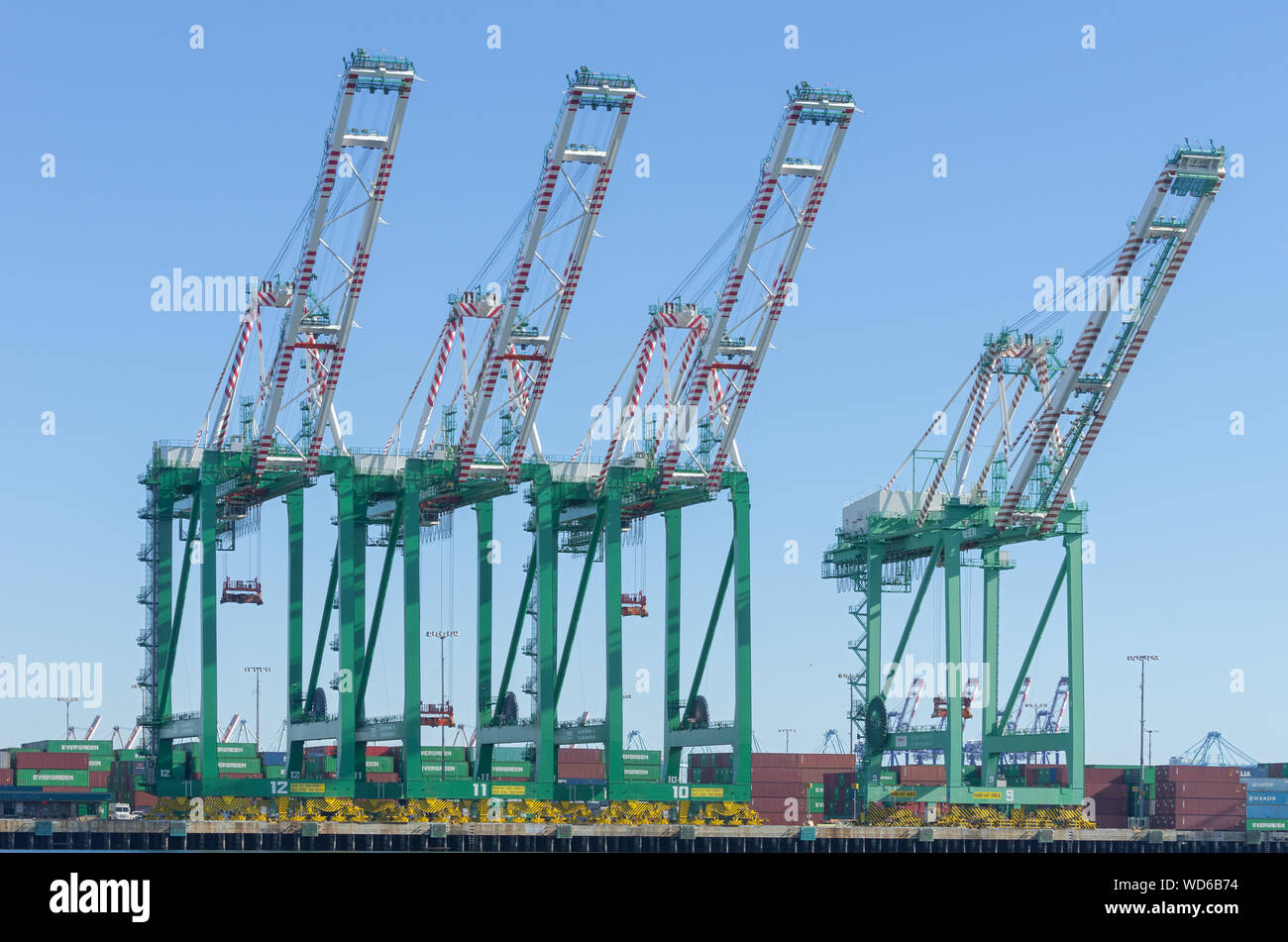 Image showing a number of Evergreen Marine Corporation cranes and containers at the Port of Los Angeles. Stock Photo