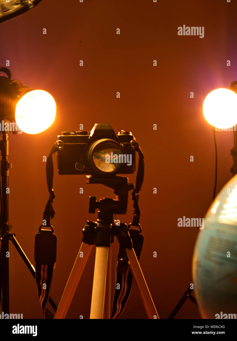 World reflection through a camera lens in a photography studio. Stock Photo