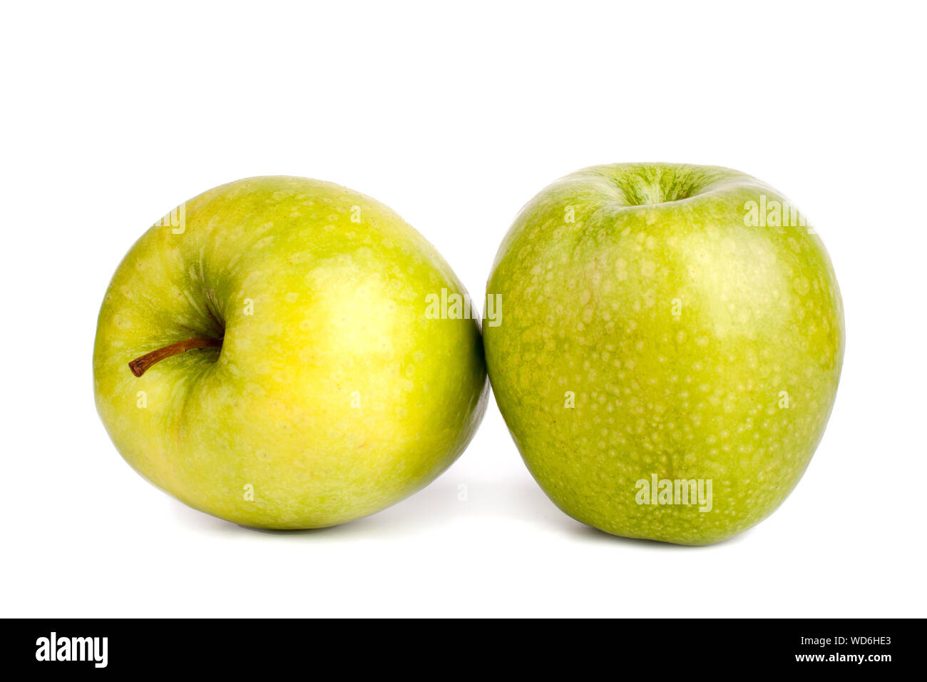 Two green apples on white background isolated close up macro Stock Photo