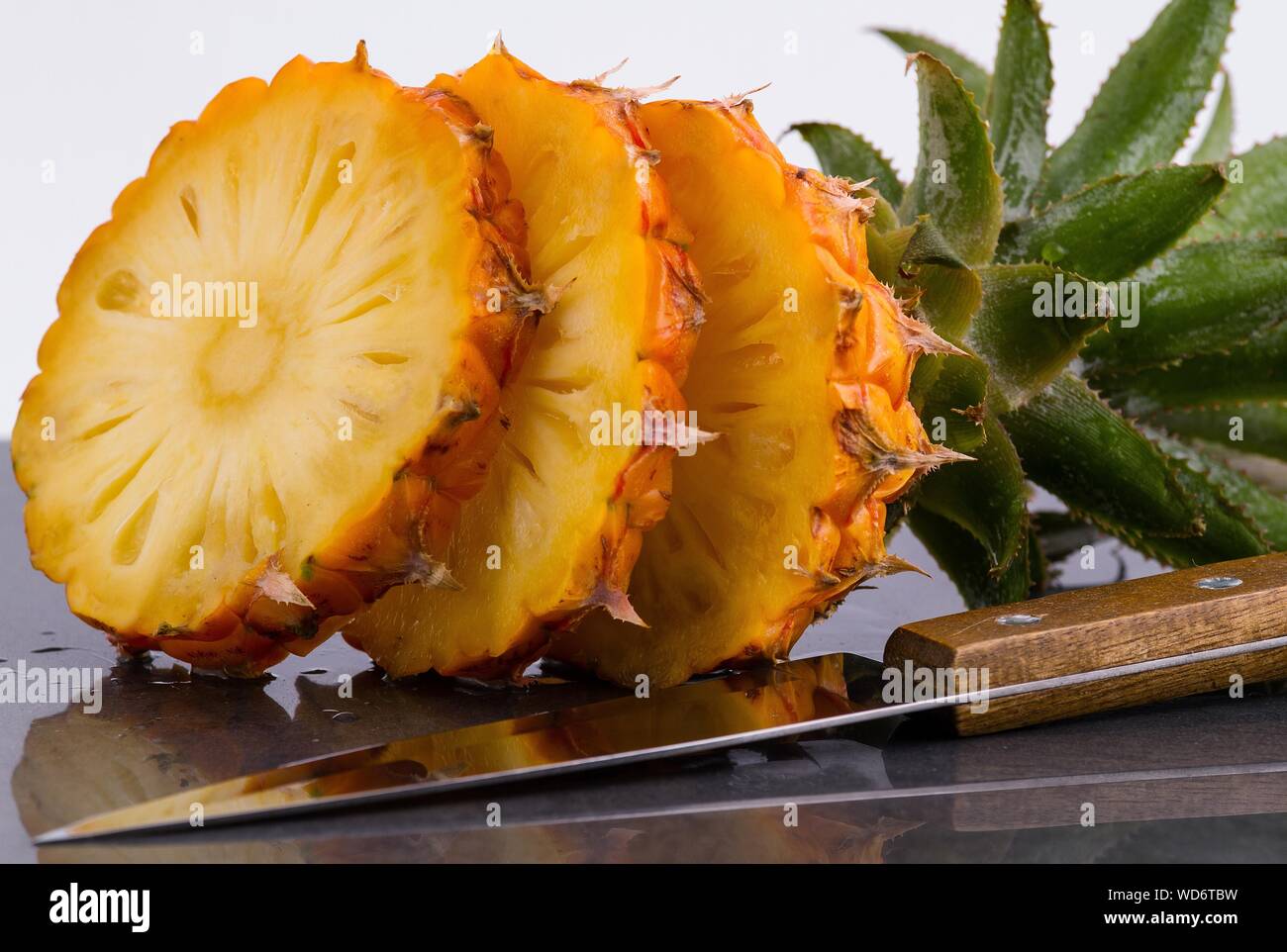 Pineapple with knife hires stock photography and images Alamy