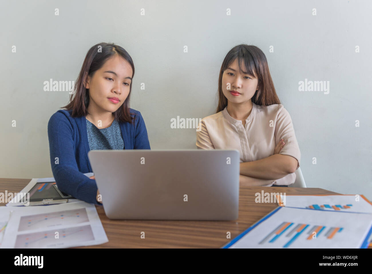 Two women financial documents hi-res stock photography and images - Alamy