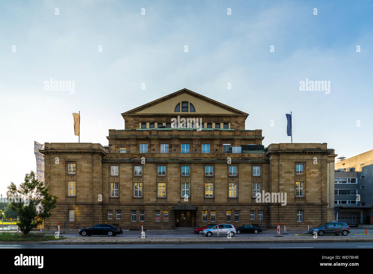 Stuttgart, Germany, August 25, 2019, Back view on facade of famous opera house in downtown palace garden with road and traffic, this is the place for Stock Photo