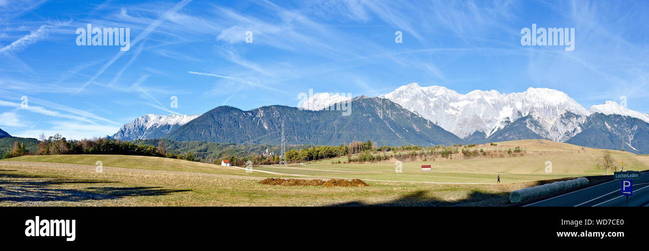 Panoramic view of the snowless Mieming Plateau with the Mieminger Mountains in the background at winter, Tirol, Austria Stock Photo