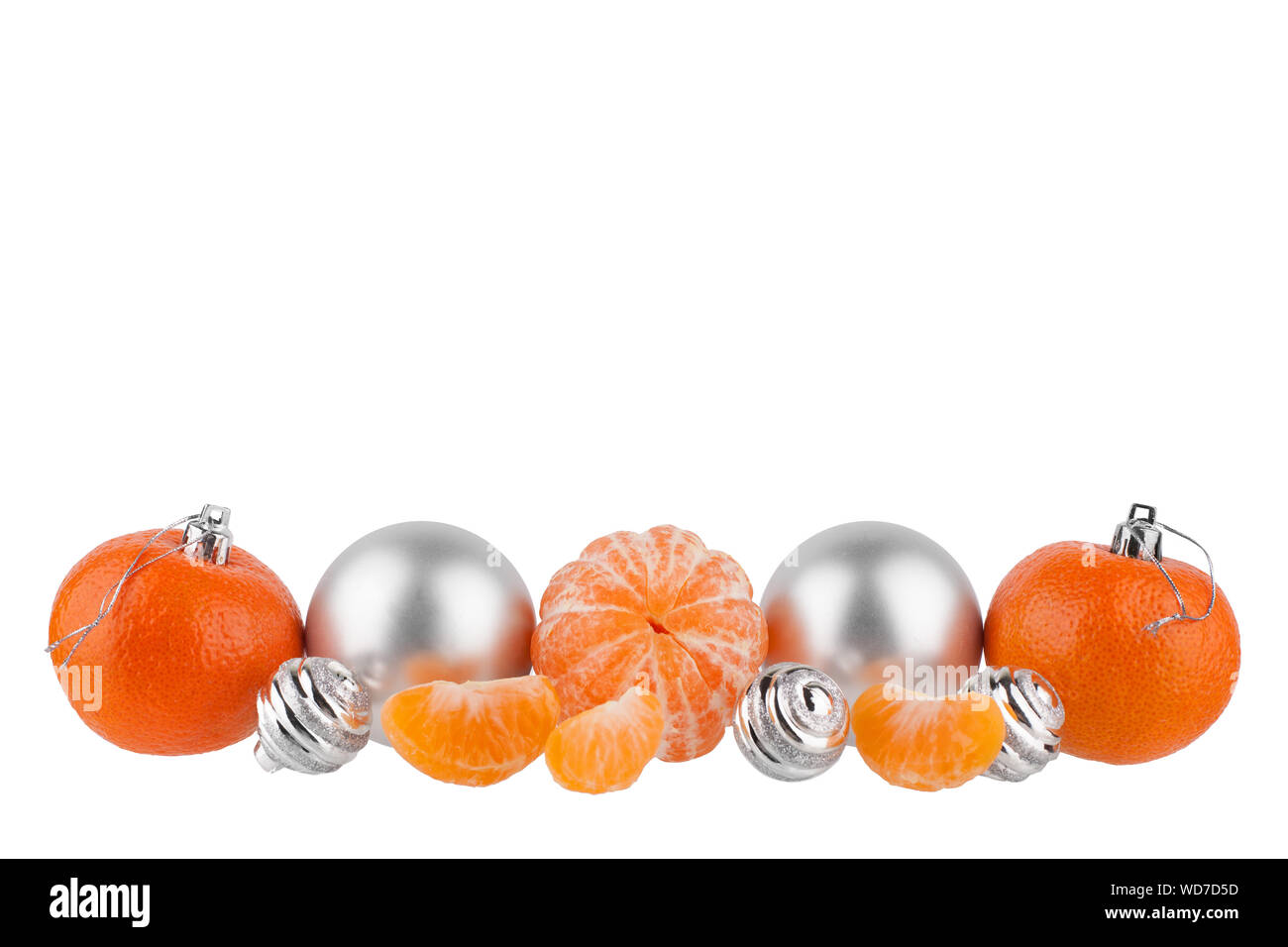 New Year border, Christmas pattern, Christmas tree decorations, silver glass balls, tangerines, mandarines on white background isolated close up Stock Photo