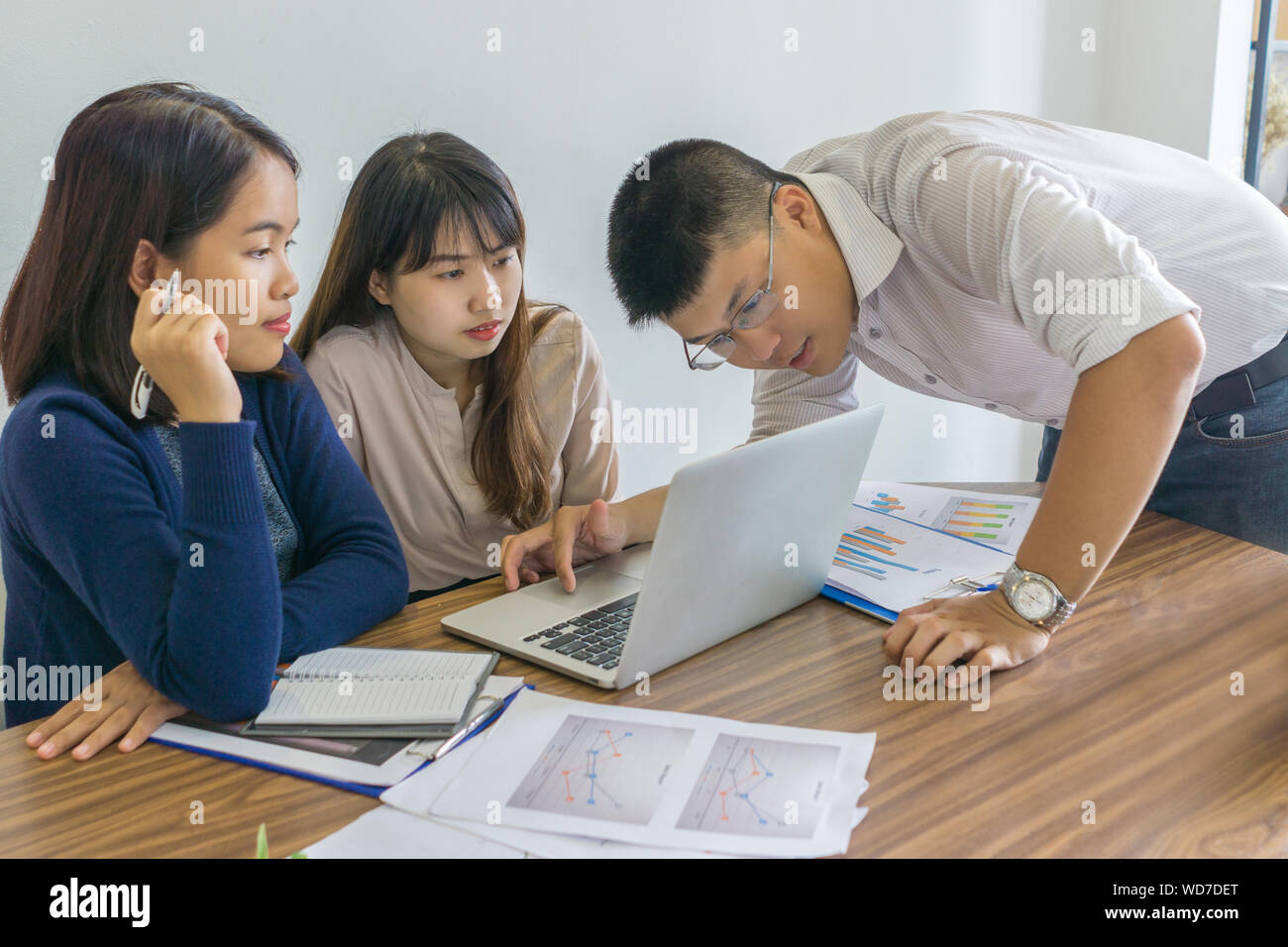 Group of people discussing and having teamwork on business project Stock Photo