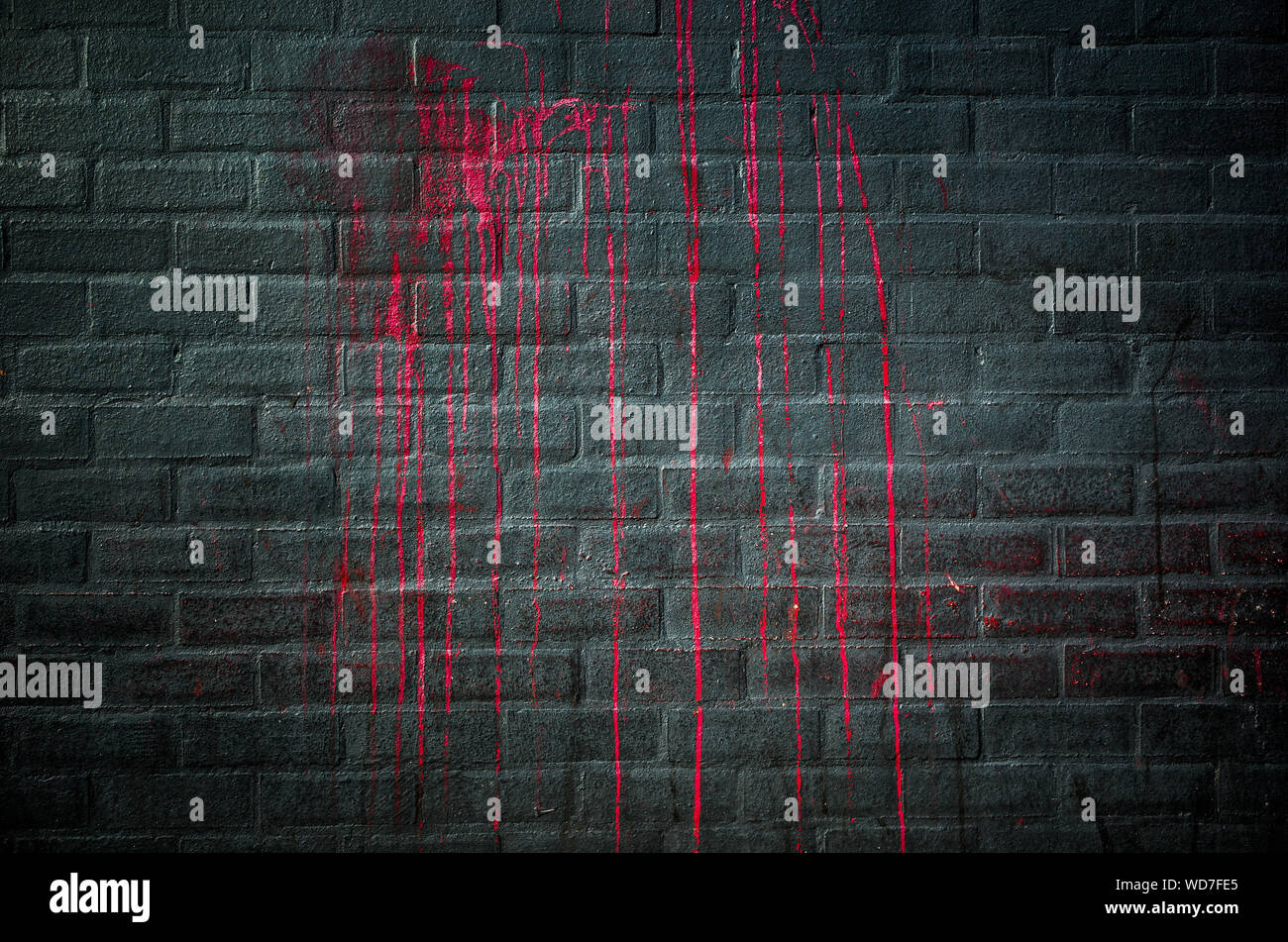 Red Paint Drips On Black Wall Background Stock Photo Alamy