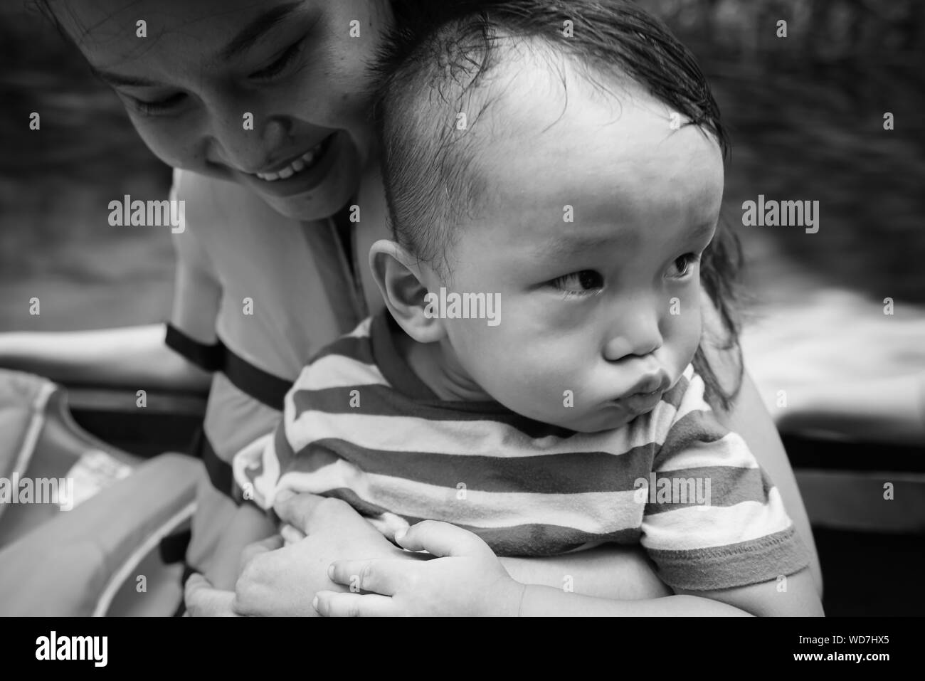 Black woman mother holding baby hi-res stock photography and images - Alamy