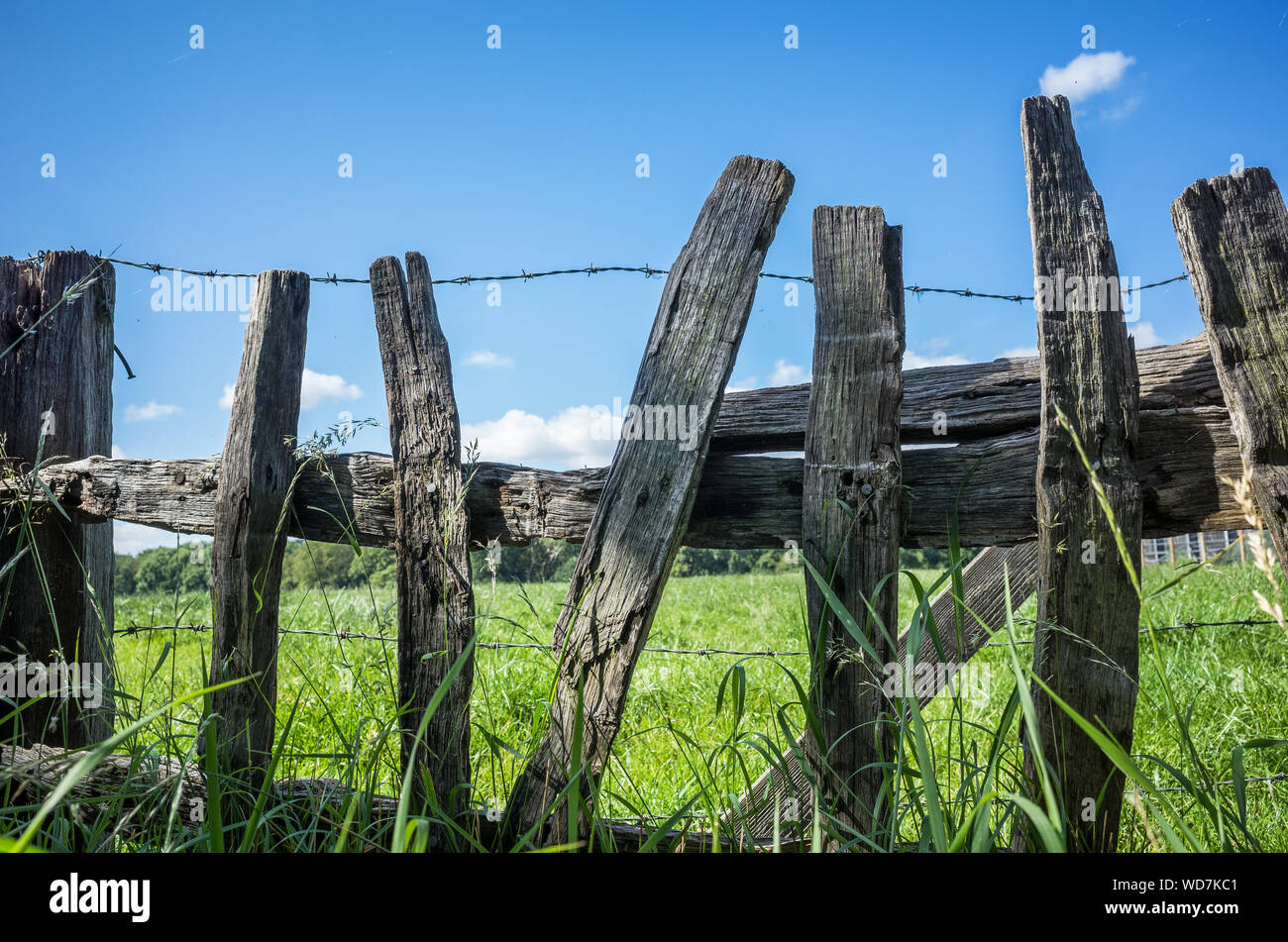 Rustic old wooden fence at the edge of a farm Stock Photo - Alamy