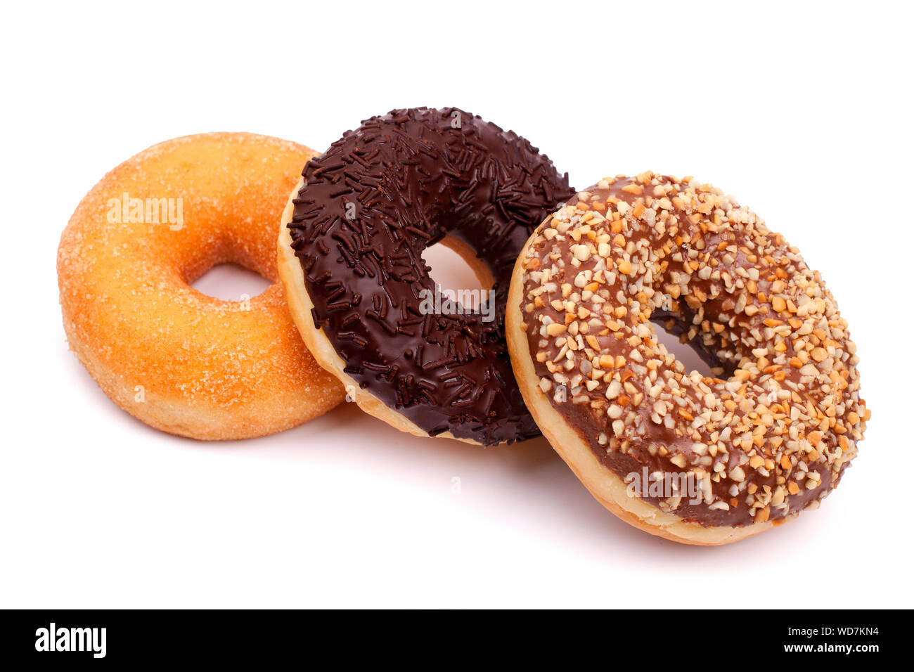 Donuts with chocolate and nuts on white background top view close up isolated Stock Photo