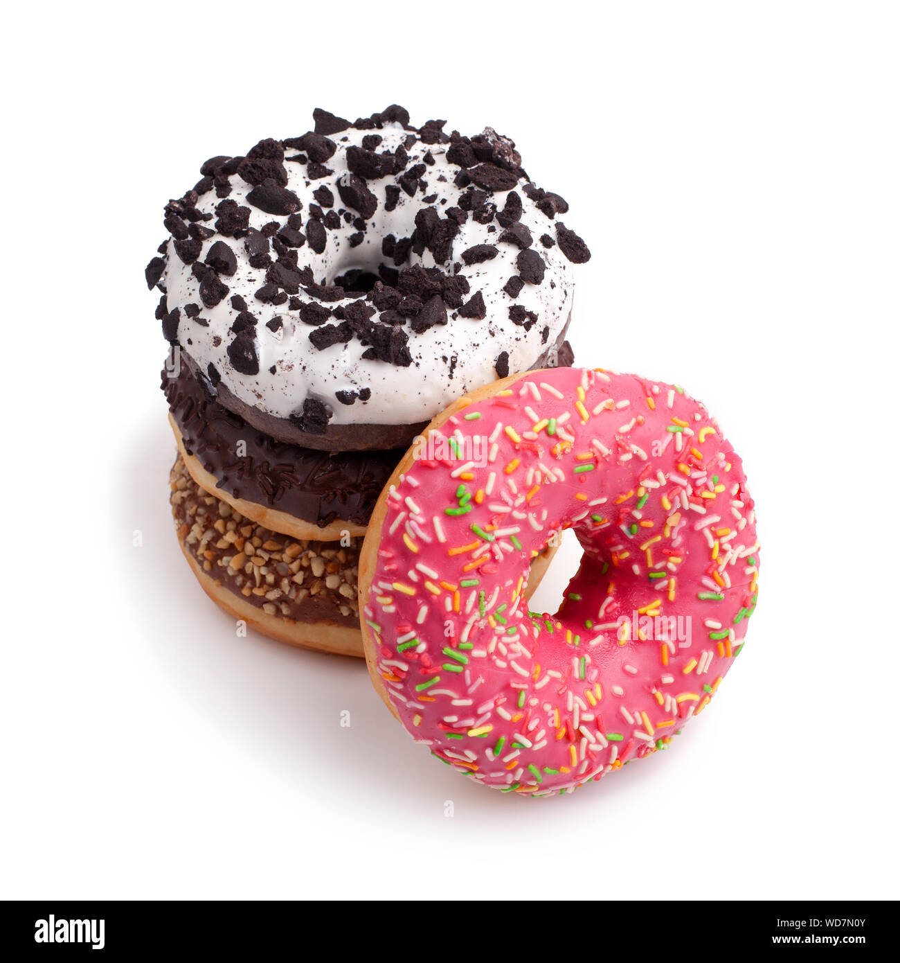 A stack of different donuts on a white background close up isolated Stock Photo