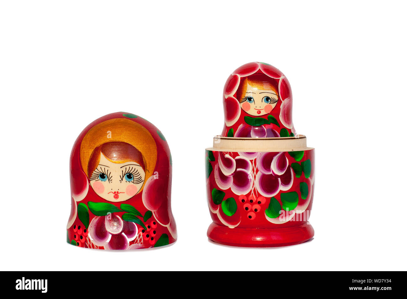 Matryoshka Russian nesting doll souvenir in group bright red on white