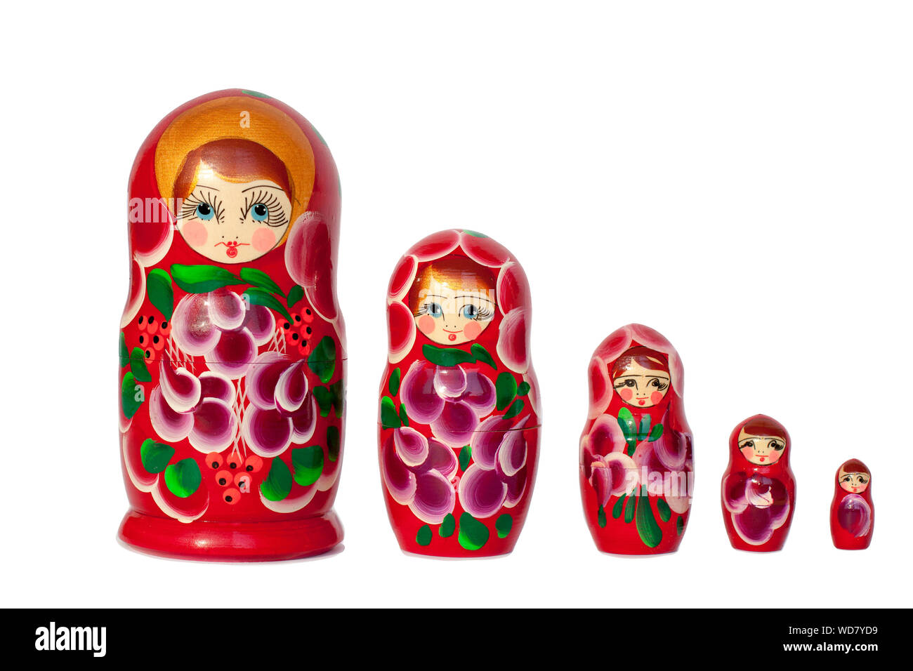 Matryoshka Russian nesting doll souvenir in group bright red on white