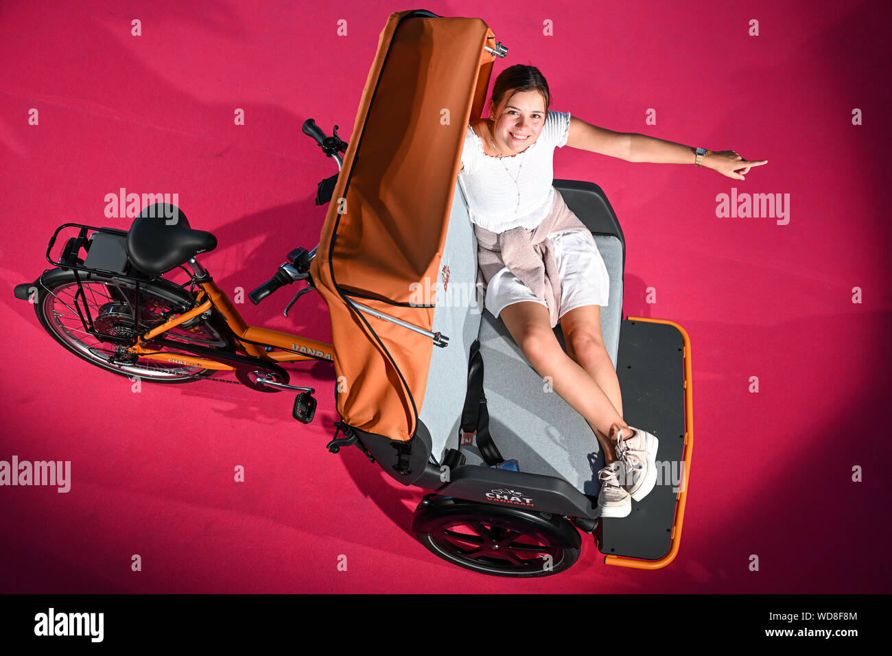 Friedrichshafen Germany 28th Aug 19 Model Christiane Sits At The Rehearsal For The Press Conference Of Eurobike 19 On The Rickshaw Called Chat By Manufacturer Van Raam The Rickshaw Has Many Safety