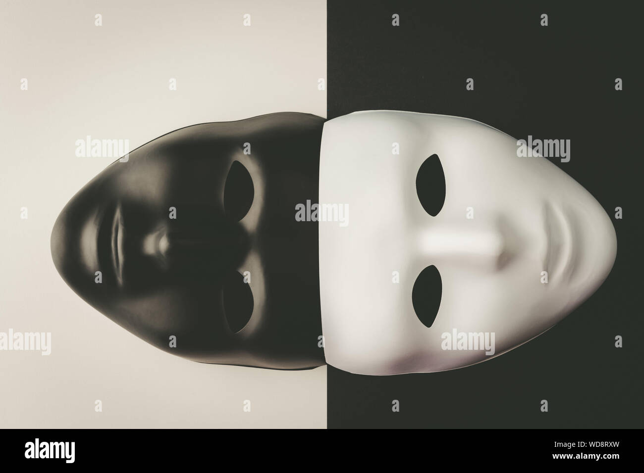 Close-up Of Masks Over Colored Background Stock Photo