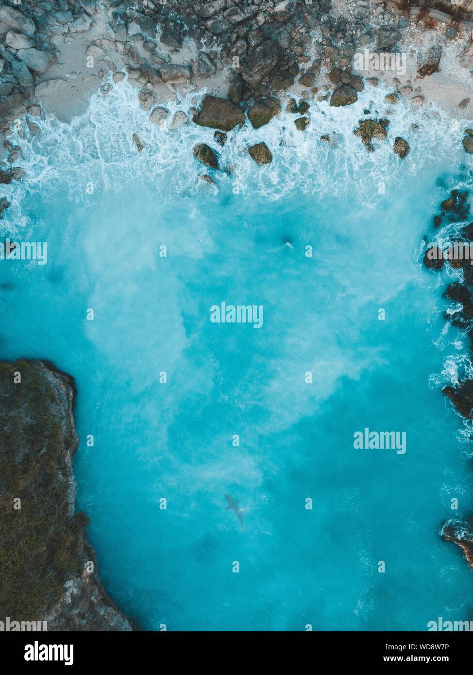 Aerial shot waves hit rocks hi-res stock photography and images - Alamy