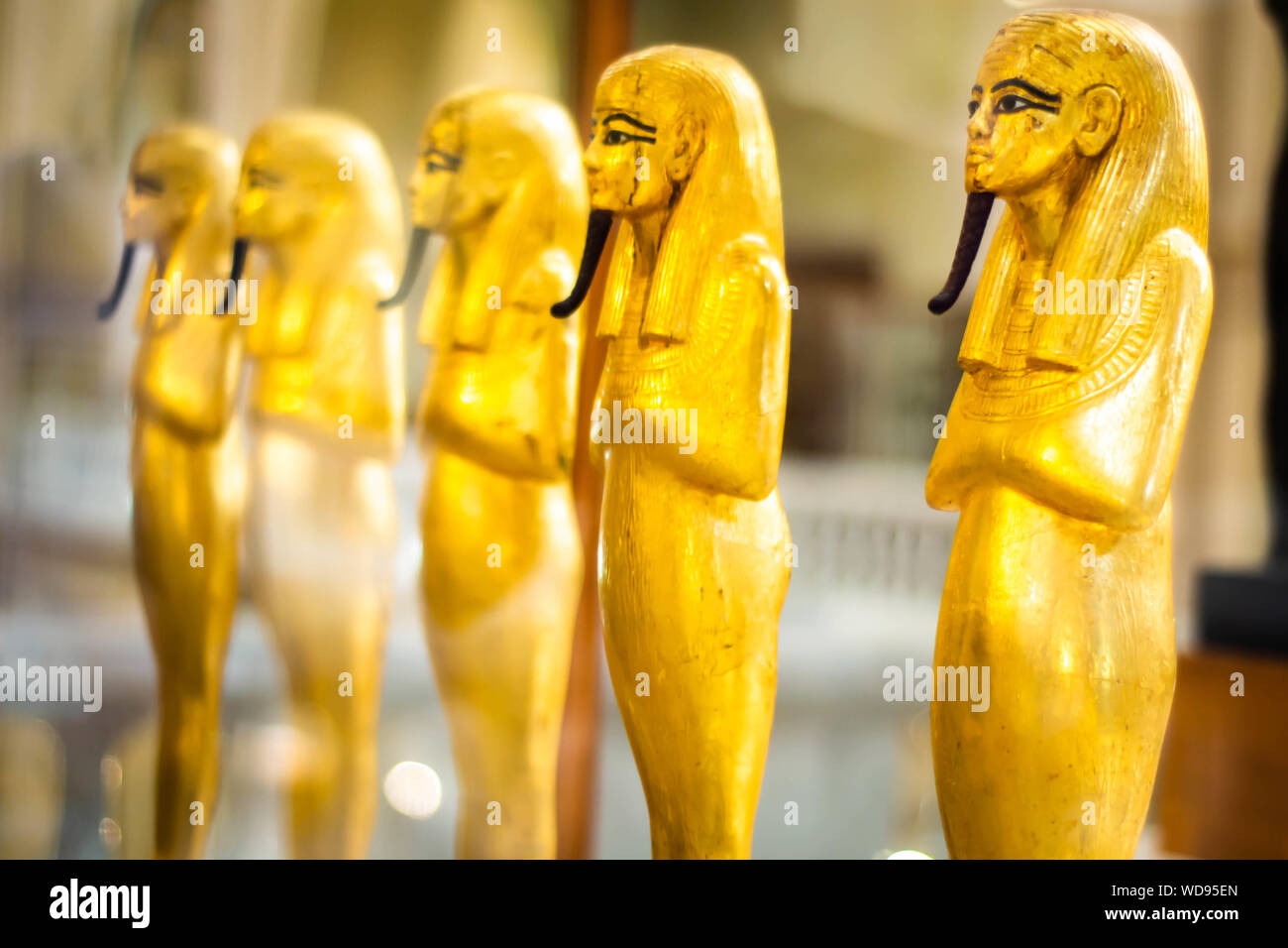 Ancient Egyptian golden statues Stock Photo Alamy