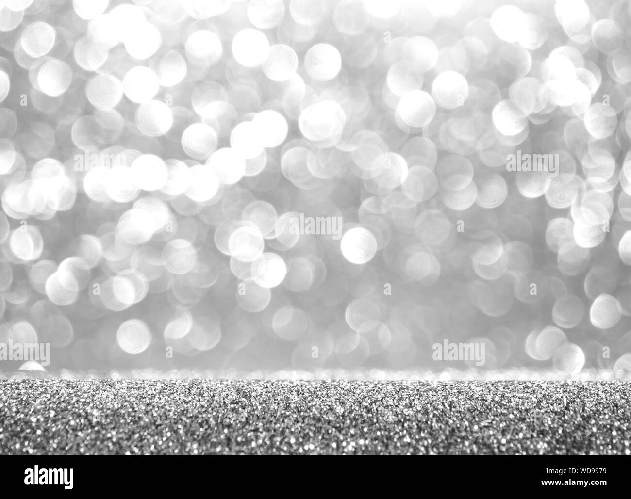 Abstract glitter silver background. Holiday shiny texture. Winter xmas theme Stock Photo