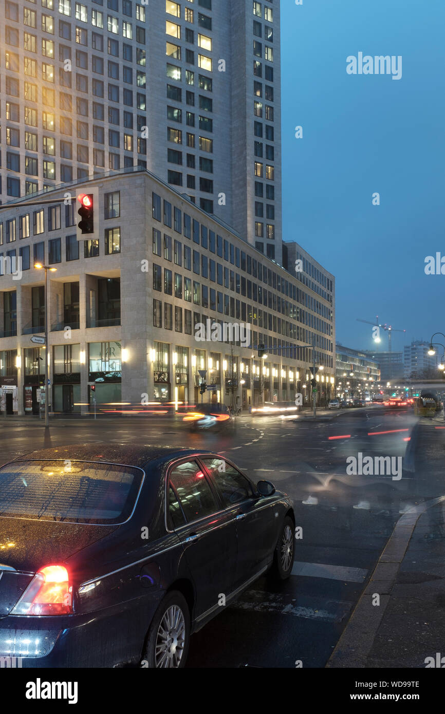 Berlin, Gerrmany-car  waiting at trafficlight on a rainy evening Stock Photo