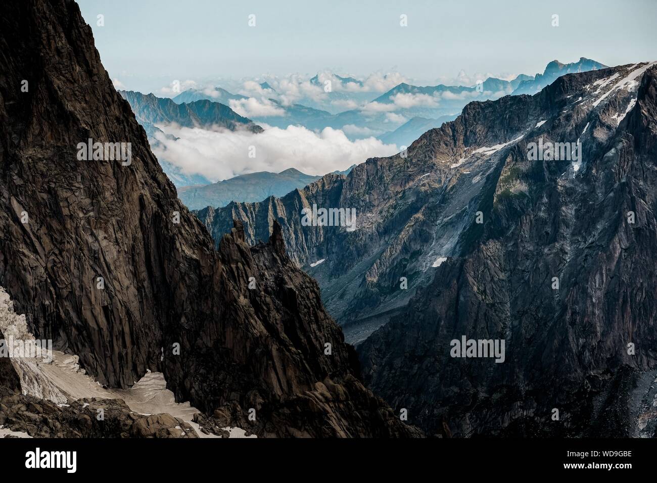 Beautiful shot of mountains with a clear sky in the background Stock Photo