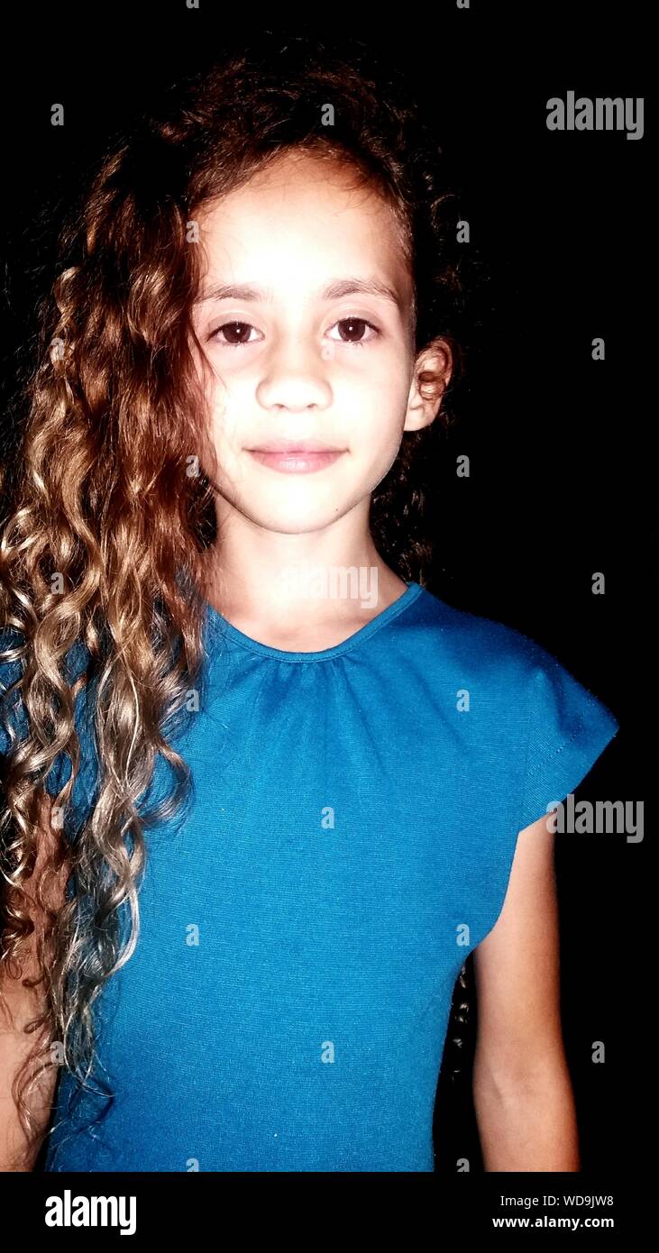 Girls brown curly hair hi-res stock photography and images - Alamy