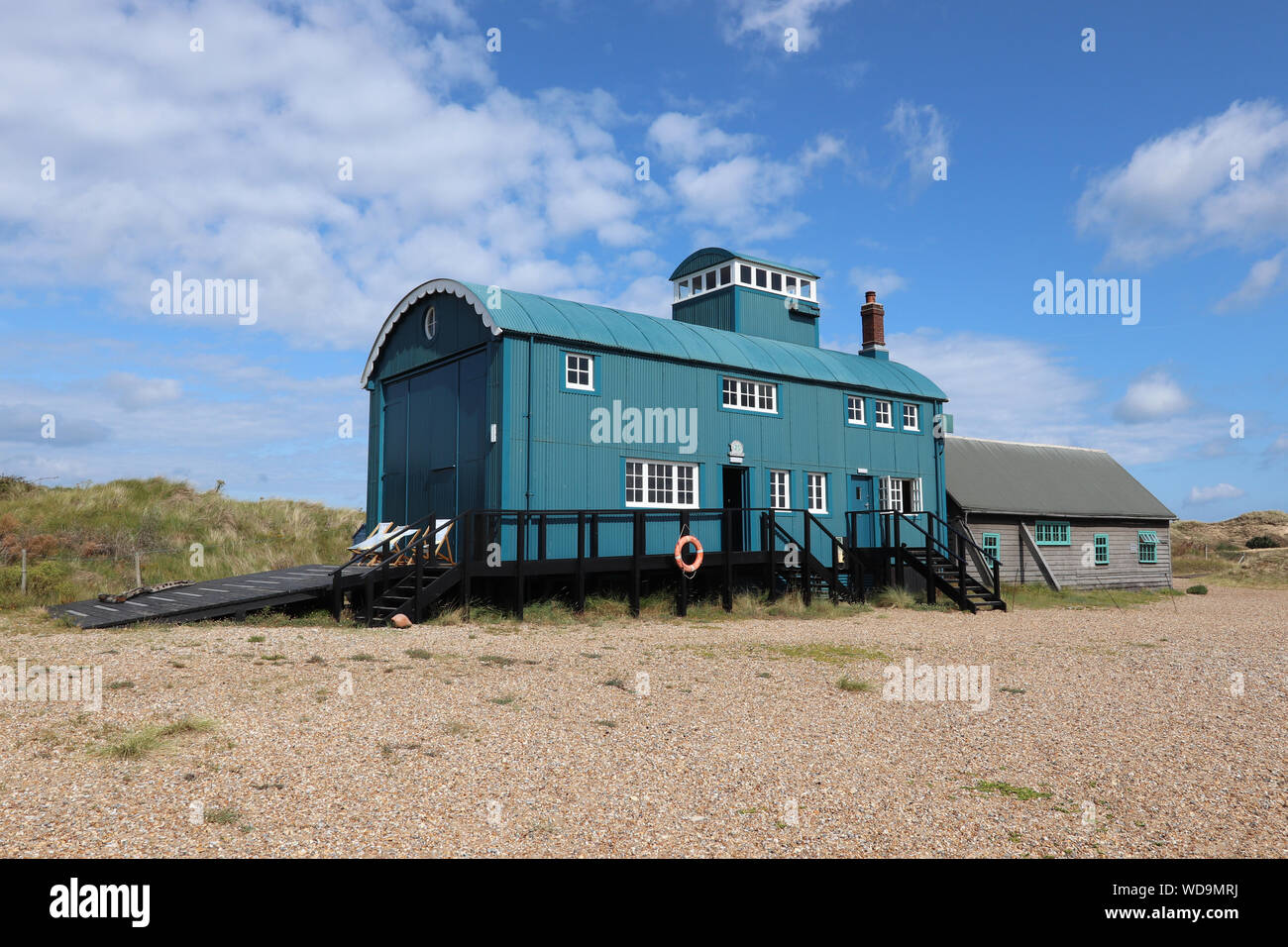 Old lifeboat house at Blakeney Beach, North Norfolk coast, on a sunny day. Stock Photo