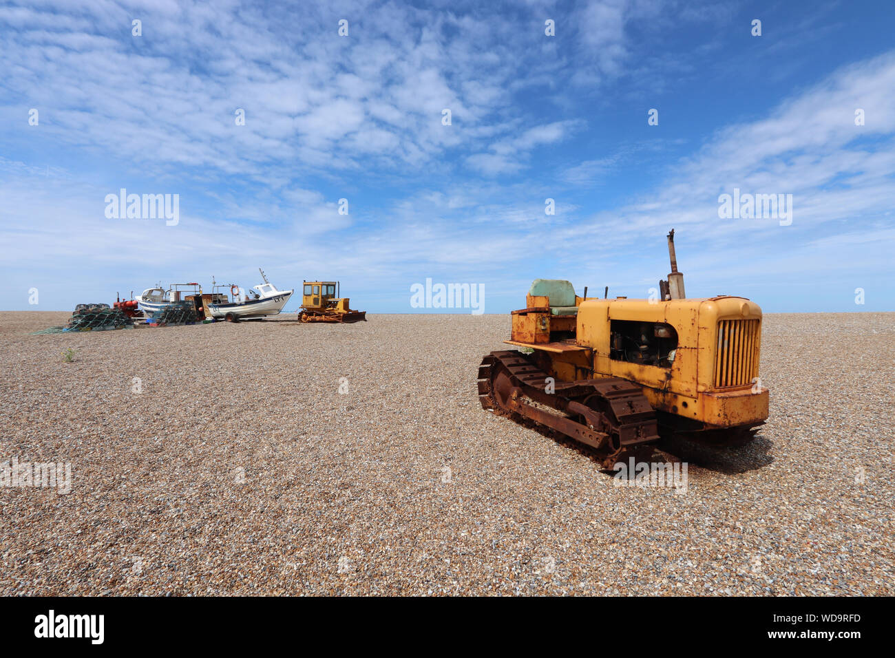 Various abandoned vehicles on Clay Beach, shot on a summers day with blue skies. Stock Photo