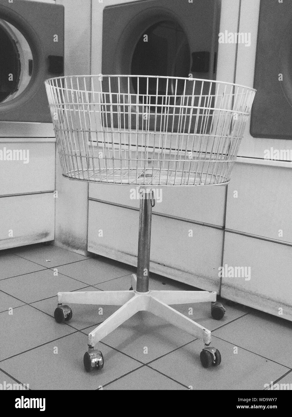 Laundry Basket At Laundromat Stock Photo Alamy