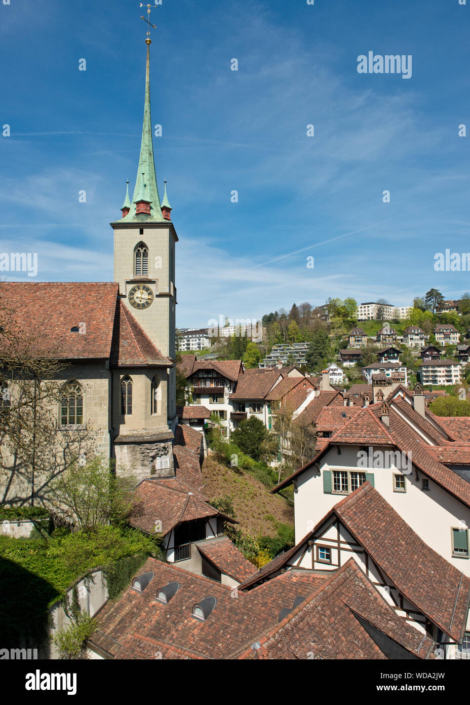 View over Old Town roof tops toward Nydeggkirche church. Bern, Switzerland Stock Photo