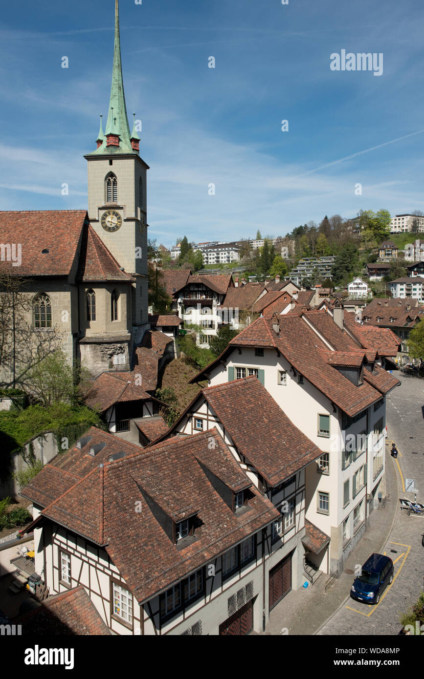 View over Old Town roof tops toward Nydeggkirche church. Bern, Switzerland Stock Photo