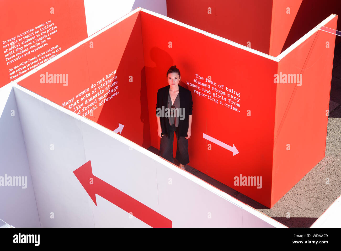 Holliday Grainger at the ActionAid UK 'Maze of Injustice' in Marble Arch, London. The maze aims to engage the public in their campaign calling for better justice for women and girls who have survived violence. Stock Photo