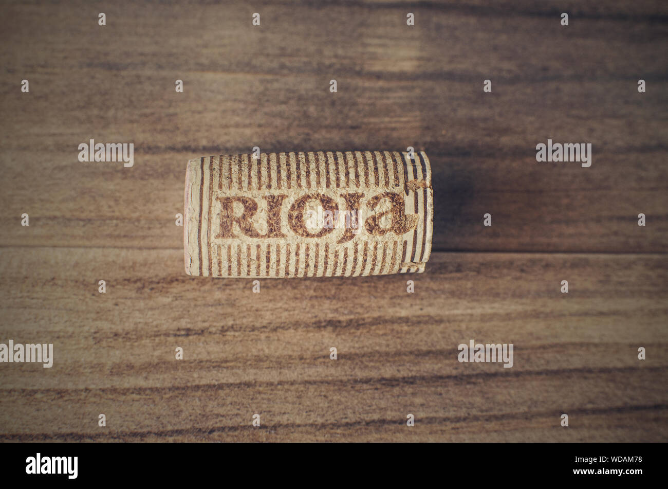 Rioja (Spain's most famous wine region) wine cork stopper on a wooden background. Stock Photo