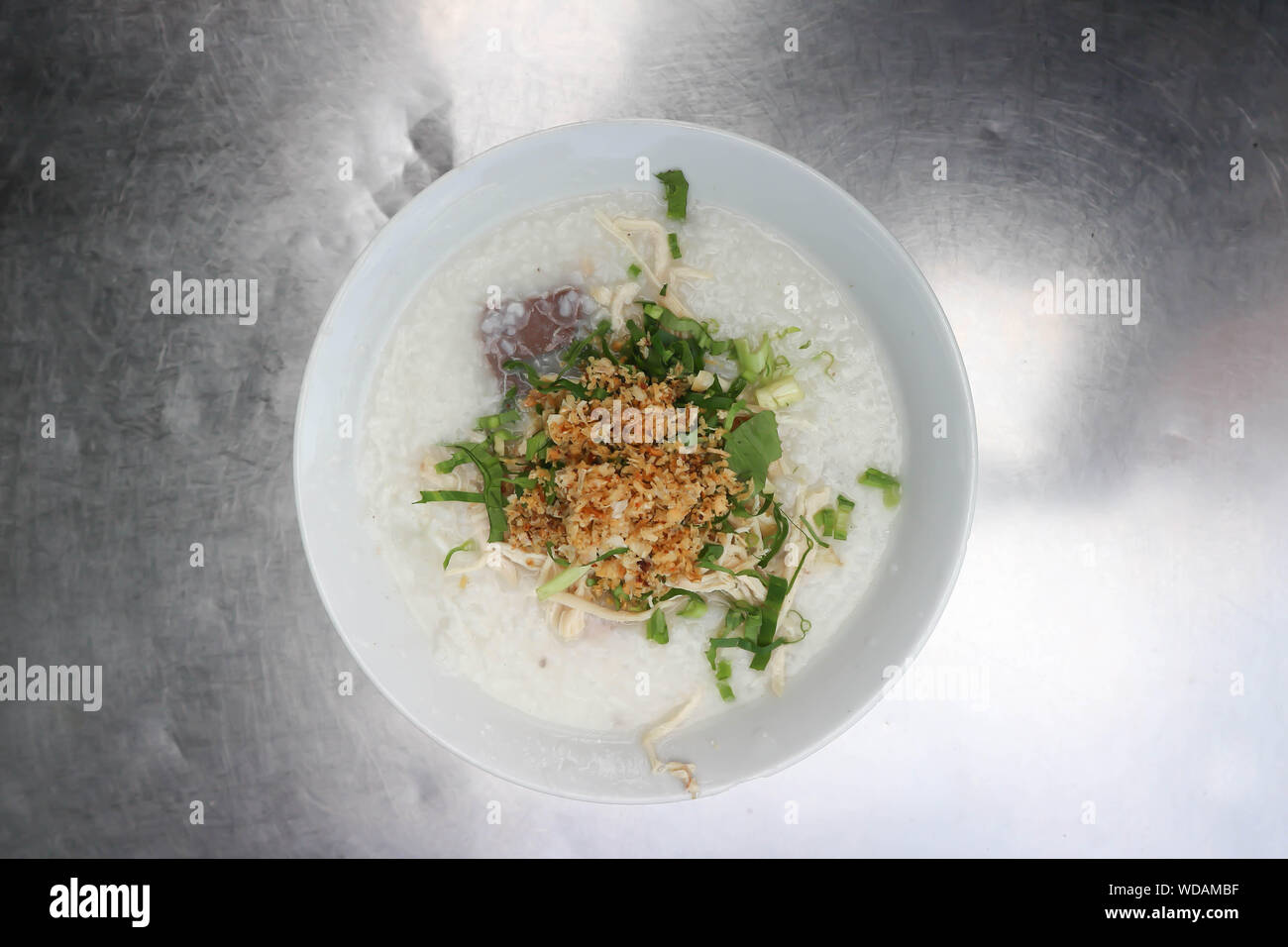 rice gruel, rice porridge or congee with chicken and vegetable Stock