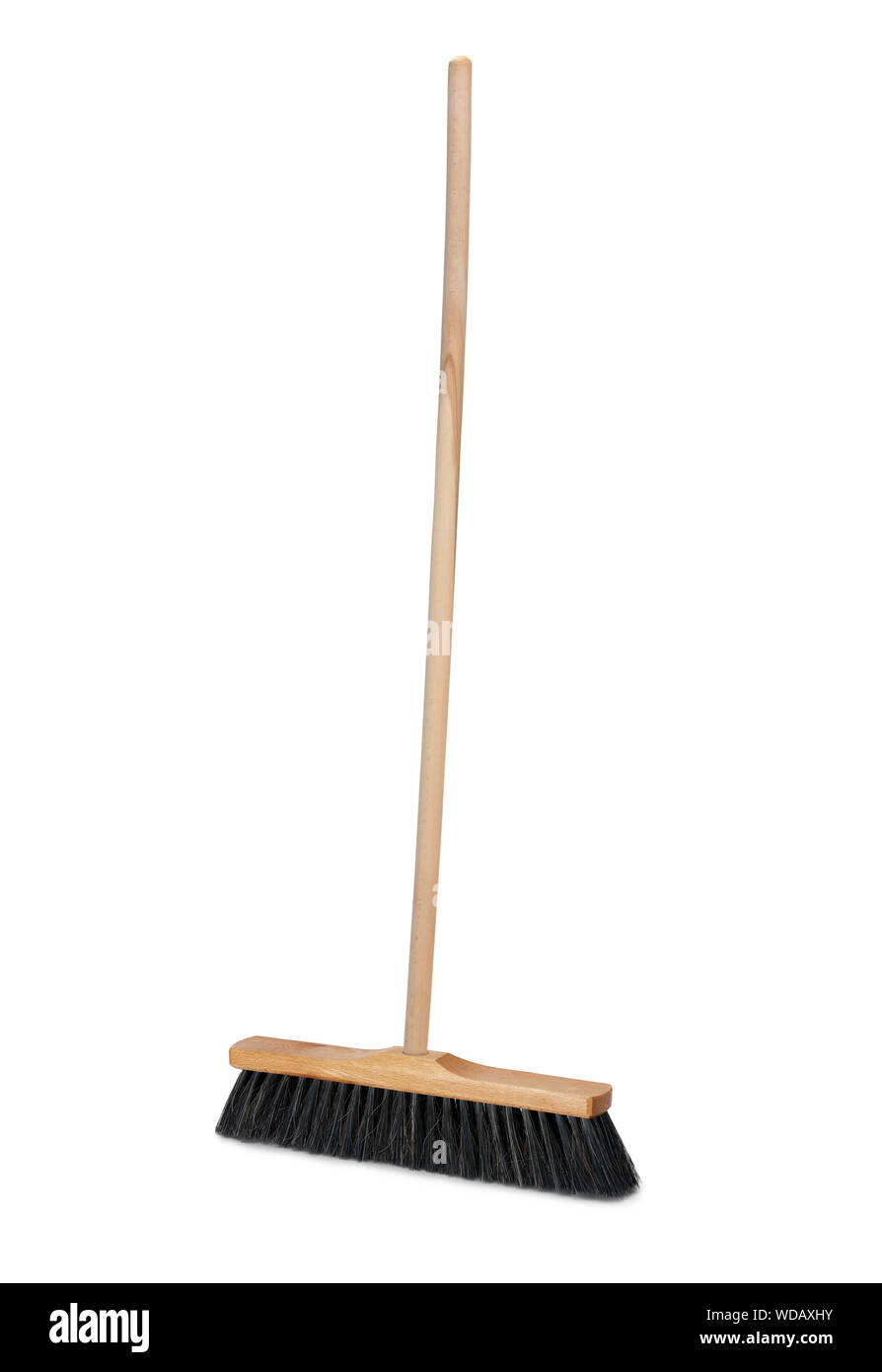 Broom with long wooden handle isolated on white background. Cleaning