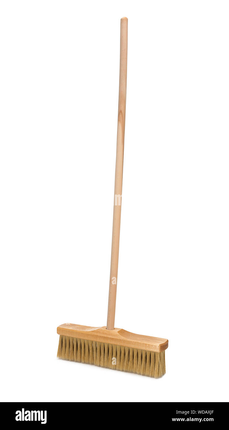 Broom with long wooden handle isolated on white background. Cleaning
