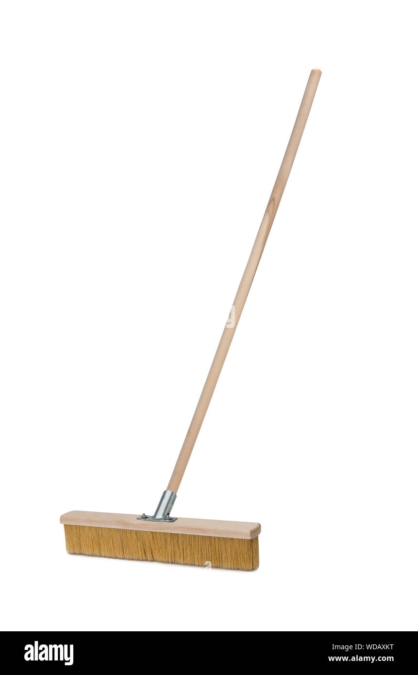 Broom with long wooden handle isolated on white background. Cleaning