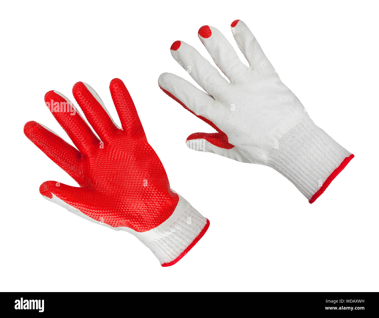 Cotton gloves with red rubber on white background. Safety gloves isolated on white background. Protective worker gloves Stock Photo