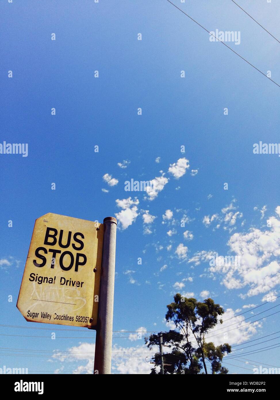 Blue bus stop sign hi-res stock photography and images - Alamy