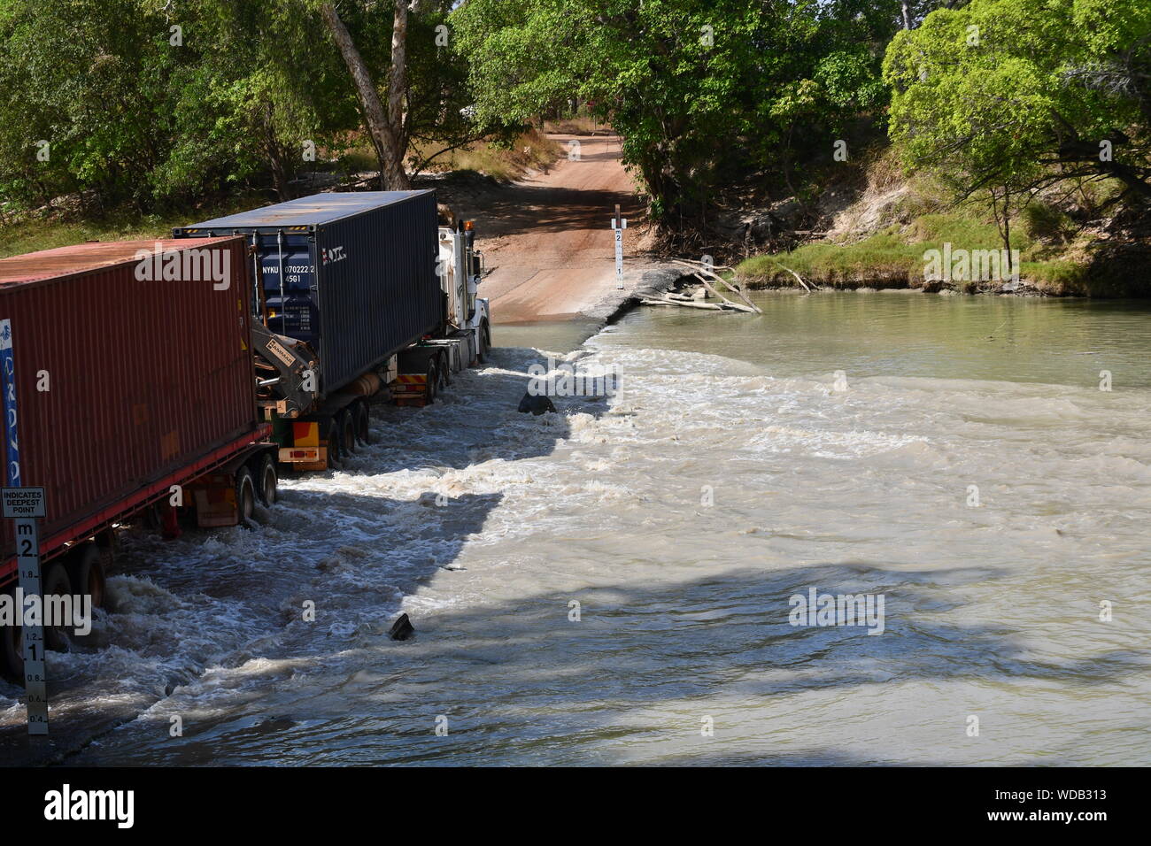 Road Train crossing the crocinfested East Alligator River using the