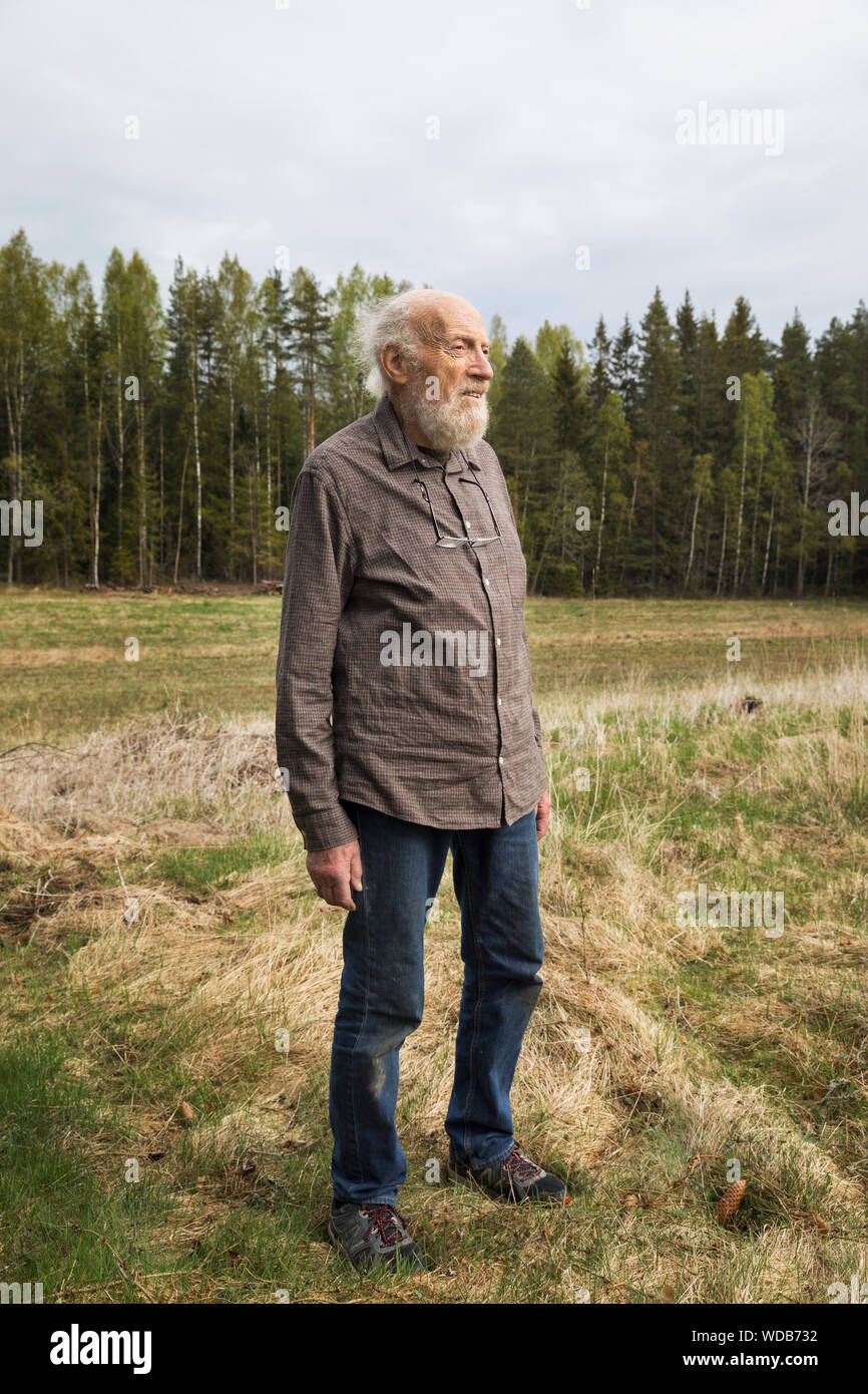 Senior man standing hi-res stock photography and images - Alamy