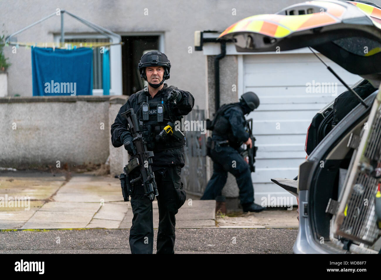 20 August 2019. Elgin, Moray, Scotland, UK. This is the scene of a Police Authorised Firearms Team conducting a raid at a house within Elgin. Stock Photo